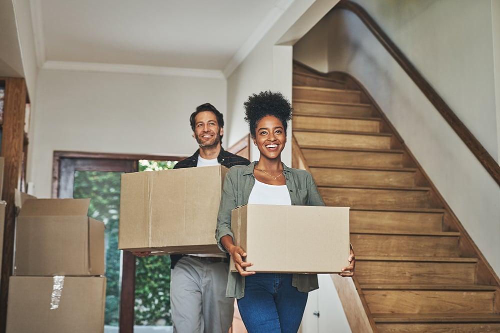 Couple Moving in with Boxes