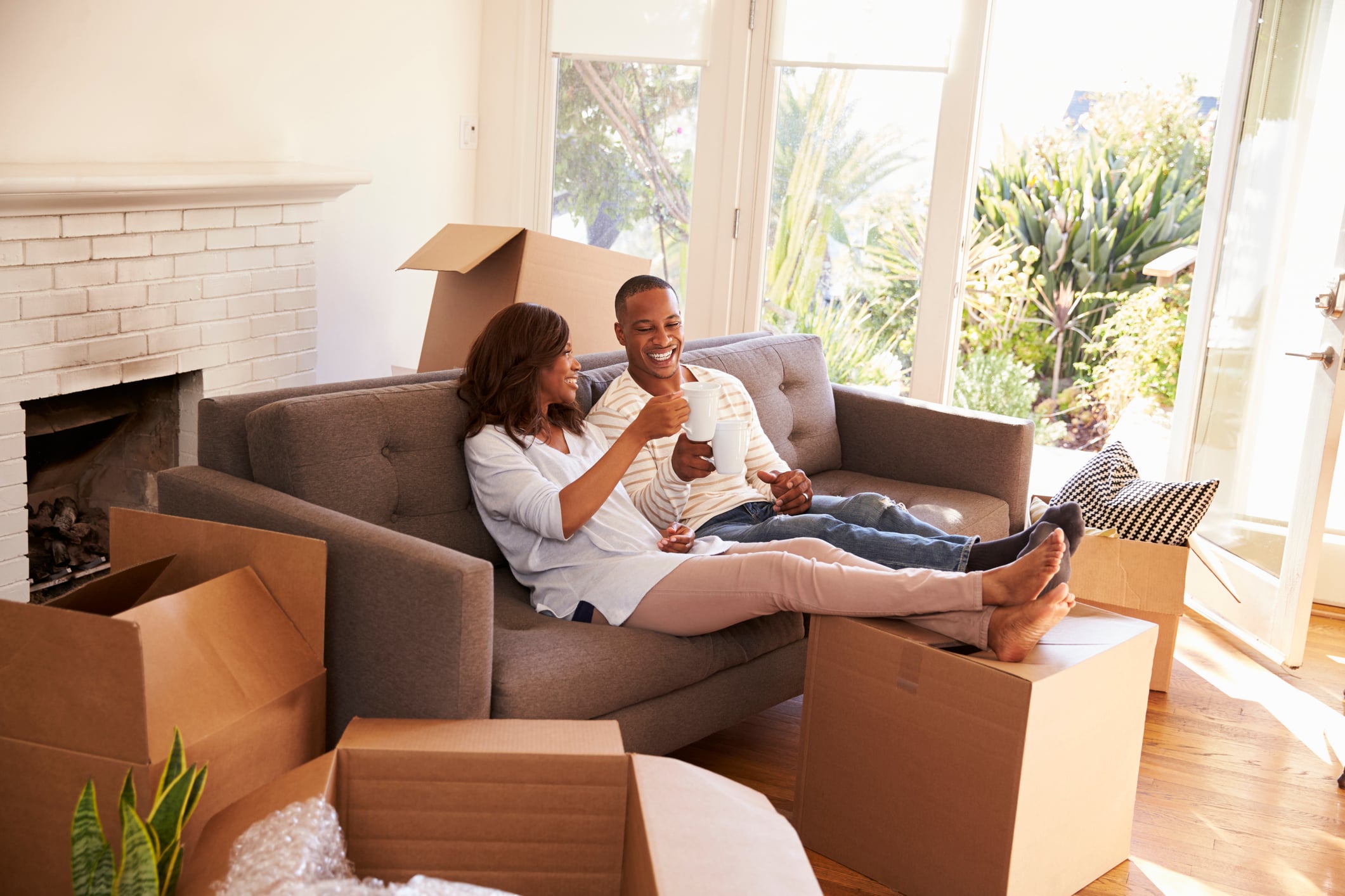 couple relaxing in their new home