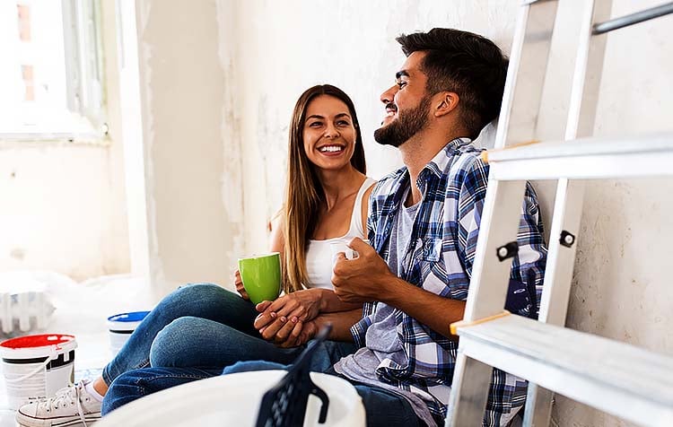 Man and woman repairing home
