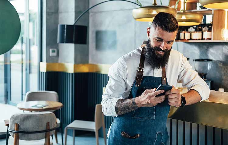 Male employee in coffee shop