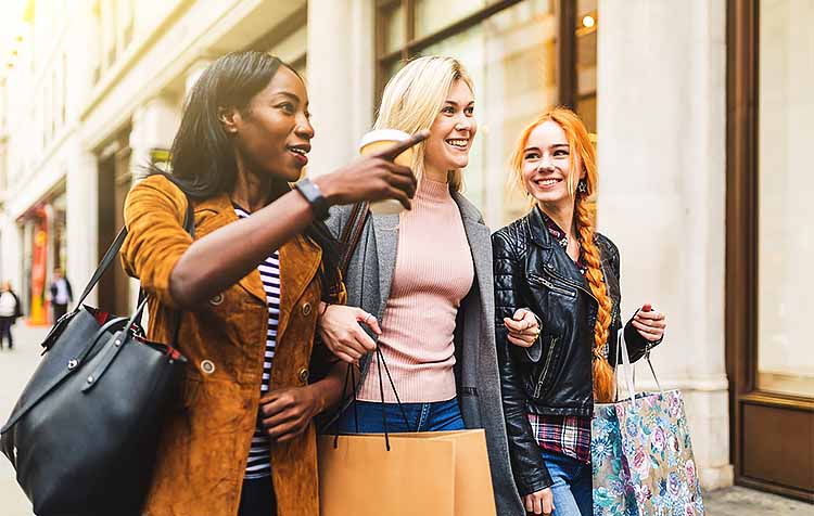 women walking together down the street
