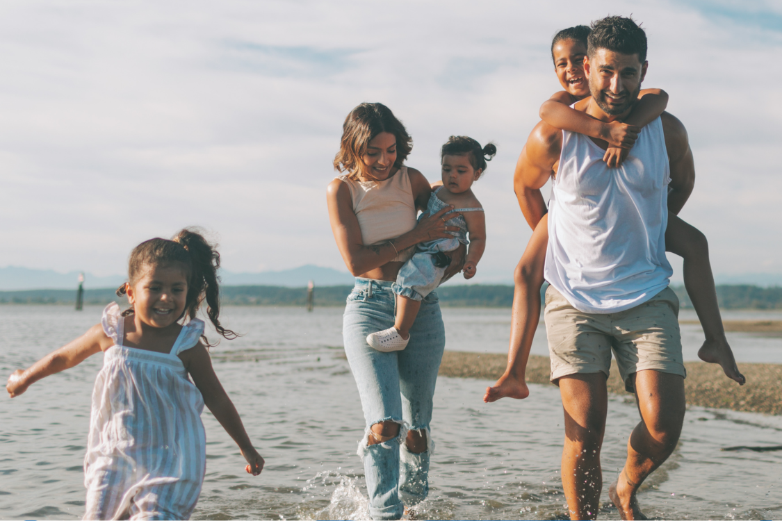 family enjoying the beach
