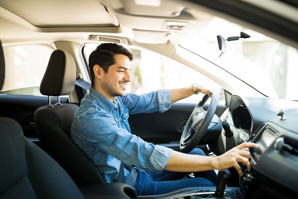 young man driving car
