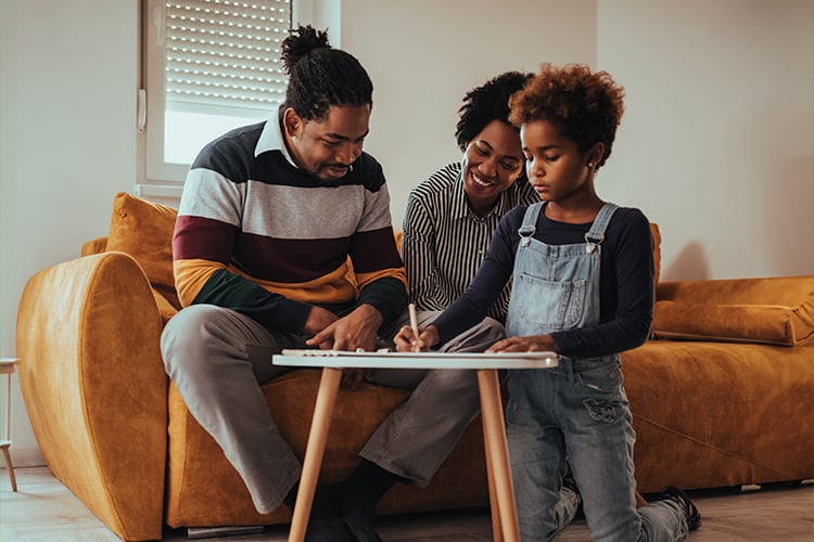 family working at a desk