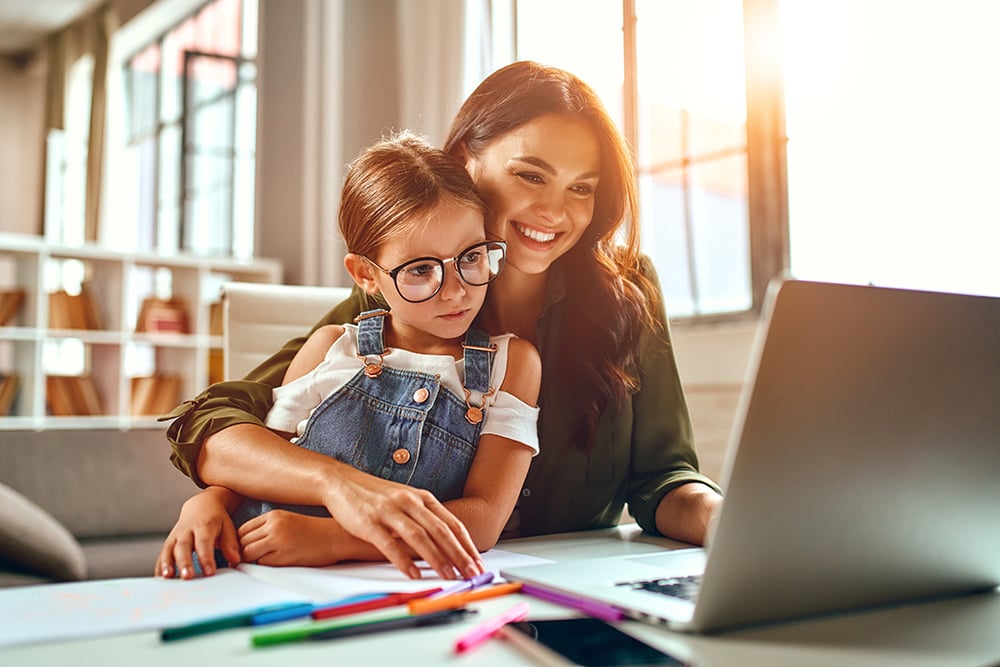 mom and daughter shopping for a home