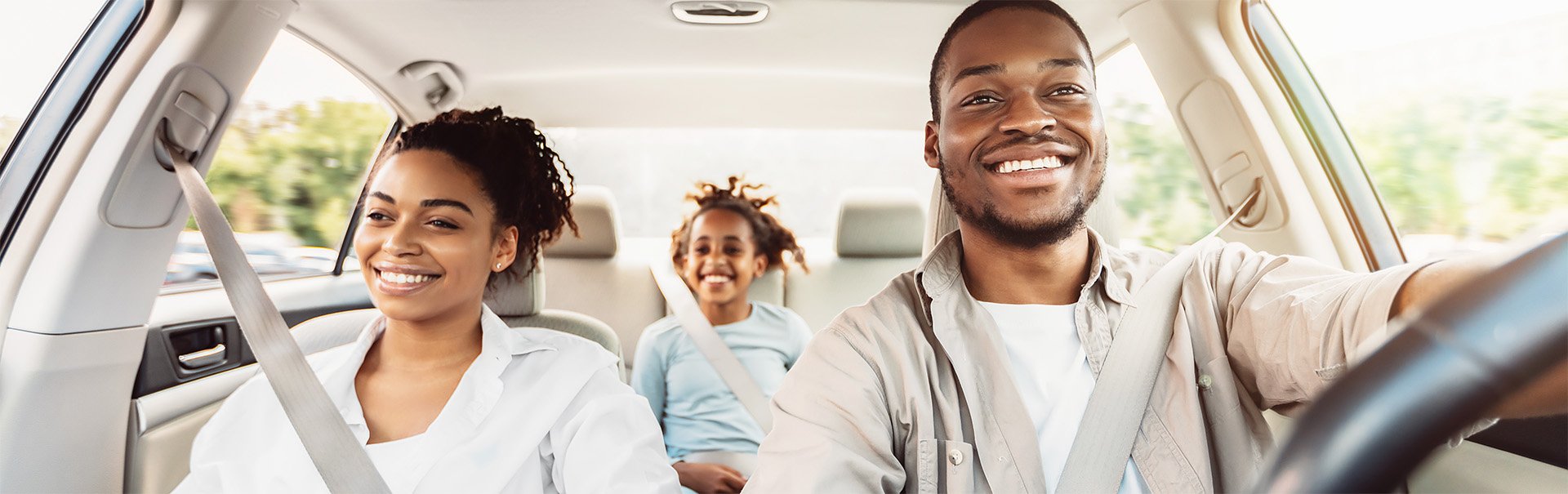 Happy Family in Car